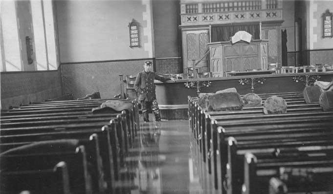 Inside the flooded Baptist Church in 1911