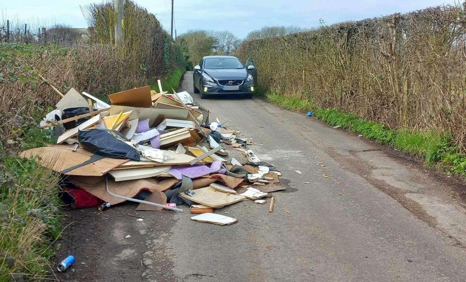 A driver struggled to get past the rubbish. Picture: Martin Deacon