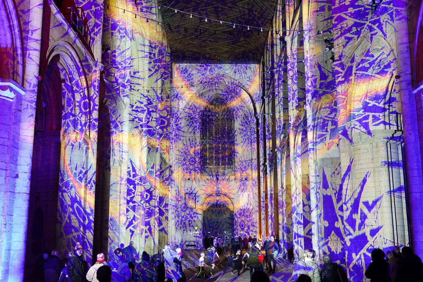 A multi-sensory digital art installation created by Luxmuralis, illuminates the nave at Peterborough Cathedral and tells the story of the Nativity (Joe Giddens/PA)