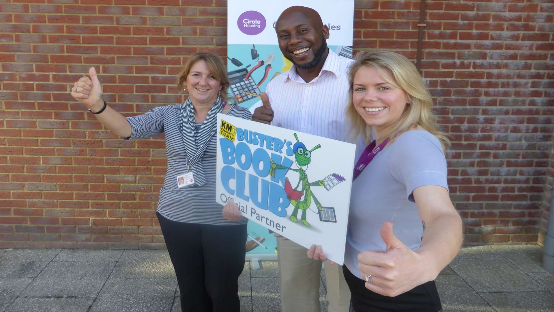 Sheena Field, Roy Morgan and Emily Foster of Circle Housing Russet which is supporting the KM reading scheme for schools Buster's Book Club.