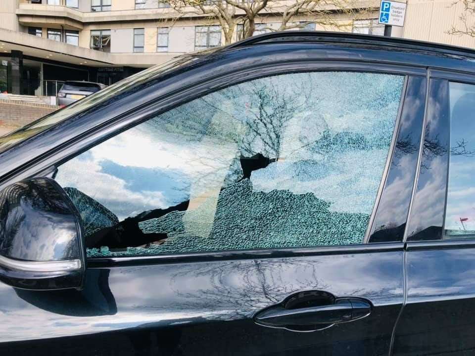 Kabi's front passenger window was completely shattered by the projectile