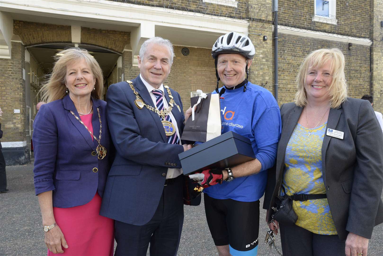 Dawn pictured in 2017 with former Mayoress Sarah Tranter and Mayor Stuart Tranter, presenting Andy Rowett with his 30-year service award. Picture: Chris Davey
