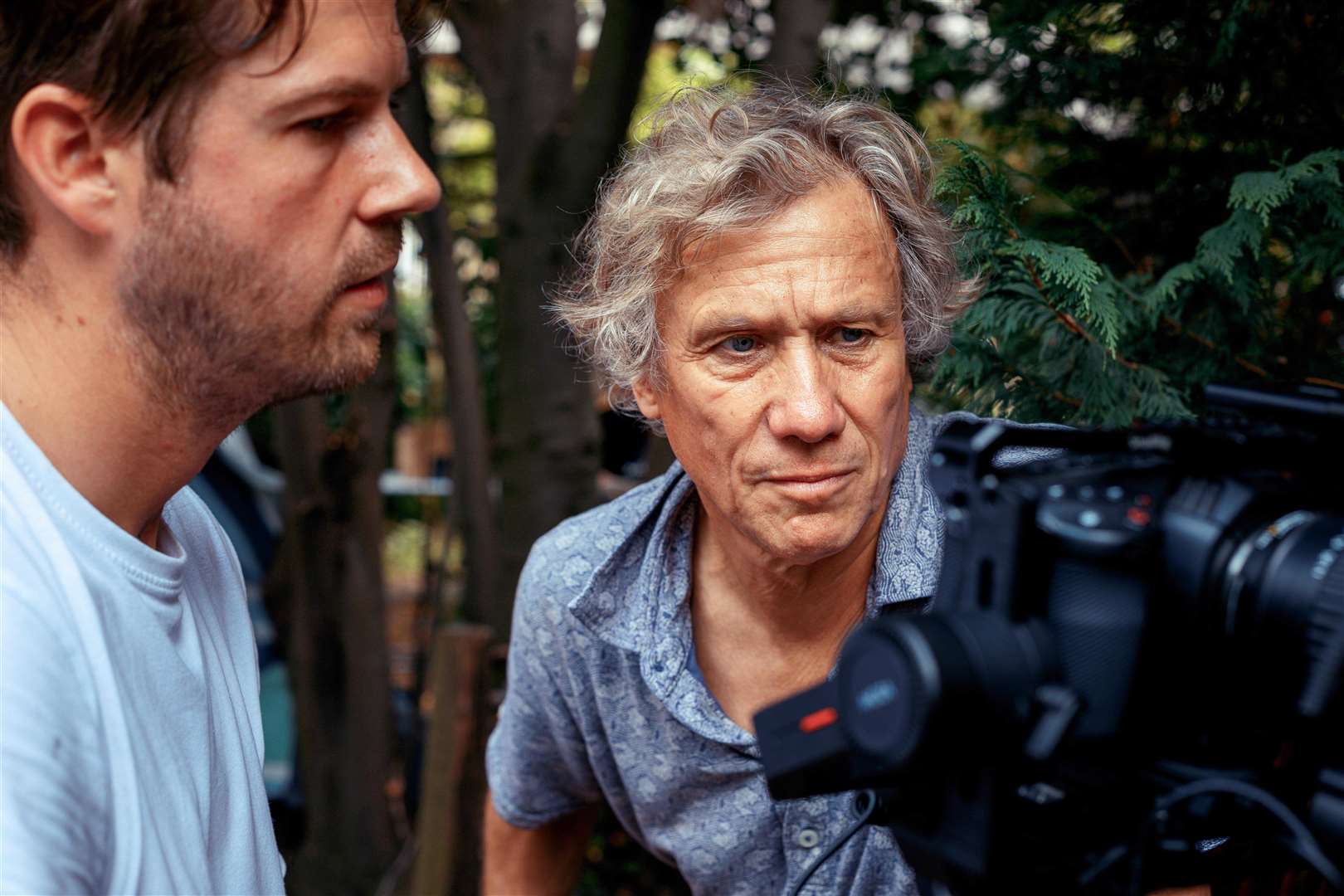 Peter Duncan with cameraman Luke Roberts on set in his garden