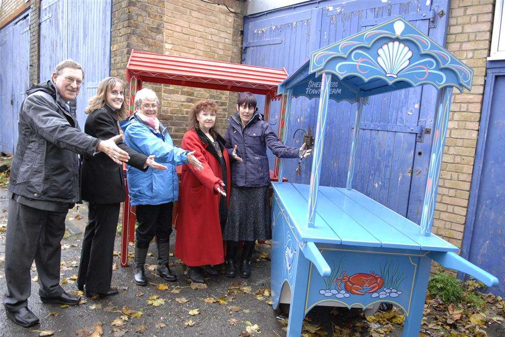 Ken Pugh, Jess McMahon, Heather Thomas-Pugh, Chris Reed and Faith Spicer-Jenkins of the Town Team with two of the the market barrows that have been specially made for Christmas in Sheerness