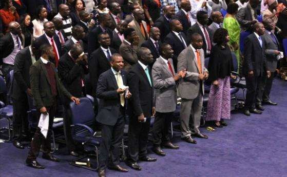 The congregation enjoy a service at Winners' Chapel in Dartford.