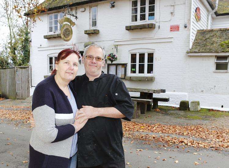 Christina Warren and Kevin de Young are leaving the pub (1315432)