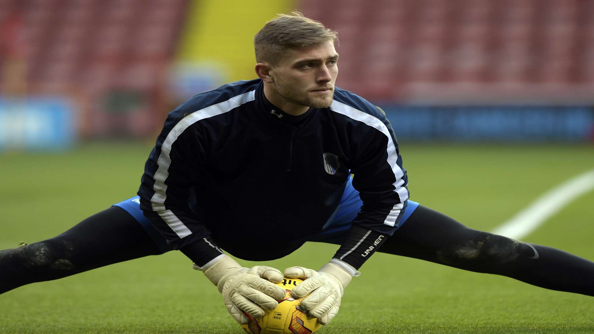 New Gillingham keeper Tomas Holy warms up at Bramall Lane Picture: Barry Goodwin
