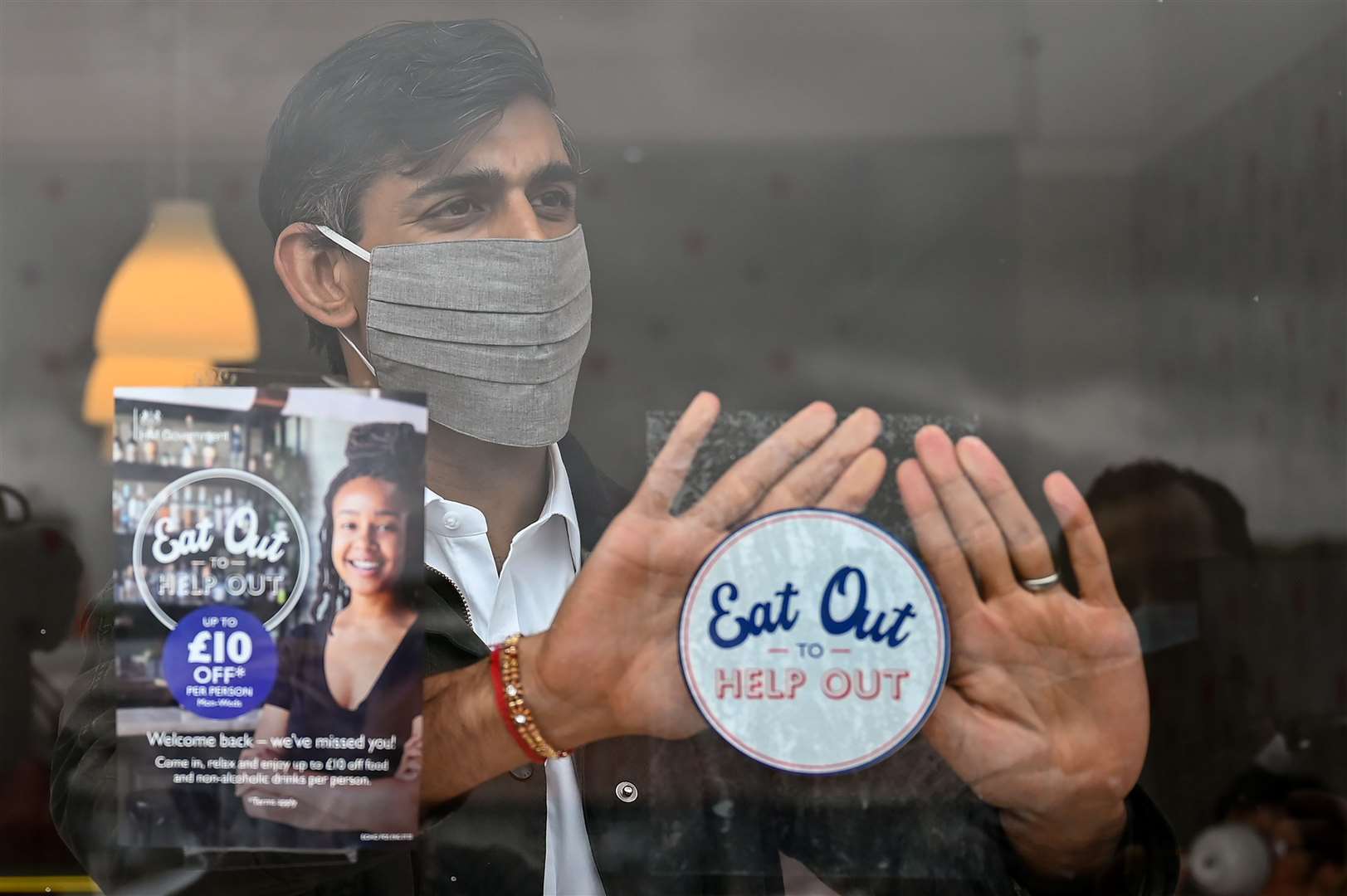 Rishi Sunak was chancellor during the pandemic when he announced the Eat Out To Help Out scheme (Jeff J Mitchell/PA)