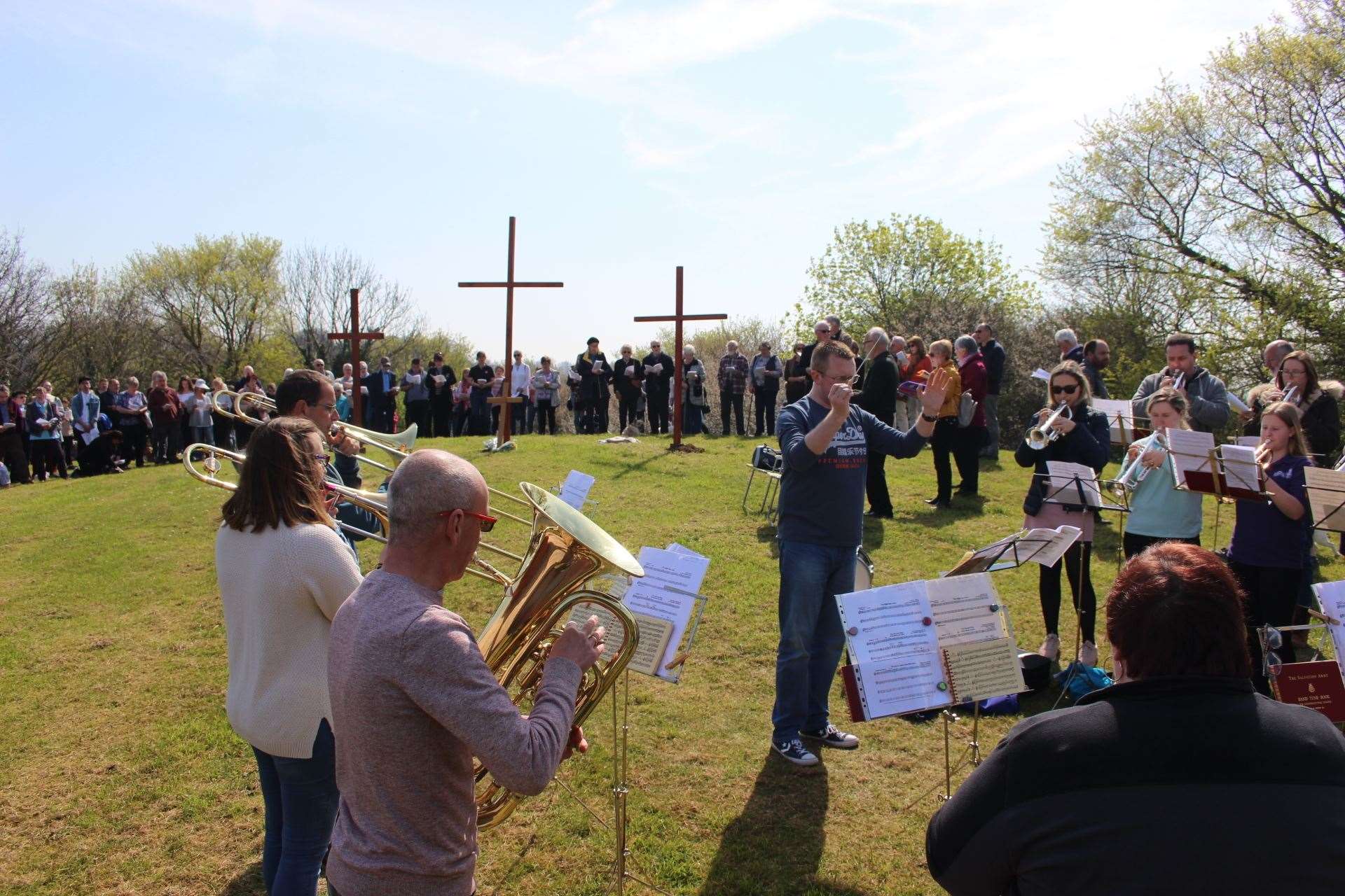 Easter at Bunny Bank at The Glen, Minster, Sheppey, in 2019 with brass band and traditional three wooden crosses