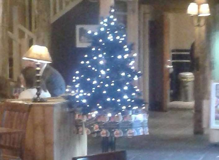A Christmas tree was put in the Ashford Harvester... in August