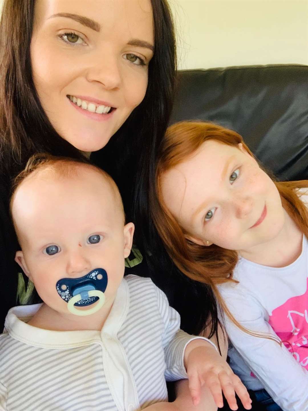 Emily Pearson, with her children Dempsey and Lily, is now a happily engaged business owner after escaping an abusive partner four years ago Picture: Emily Pearson