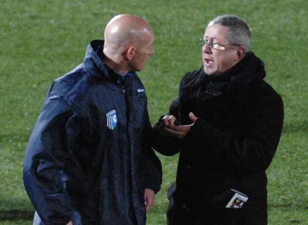 Gills chairman Paul Scally in conversation with manager Mark Stimson
