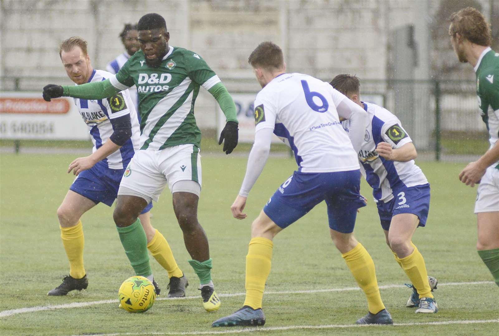 Ashford forward David Smith finds himself surrounded during Saturday's game against Haywards Heath Picture: Paul Amos