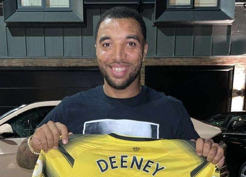Troy Deeney poses with a Watford shirt for Wing Kingz. Pic: Aaron Murrell