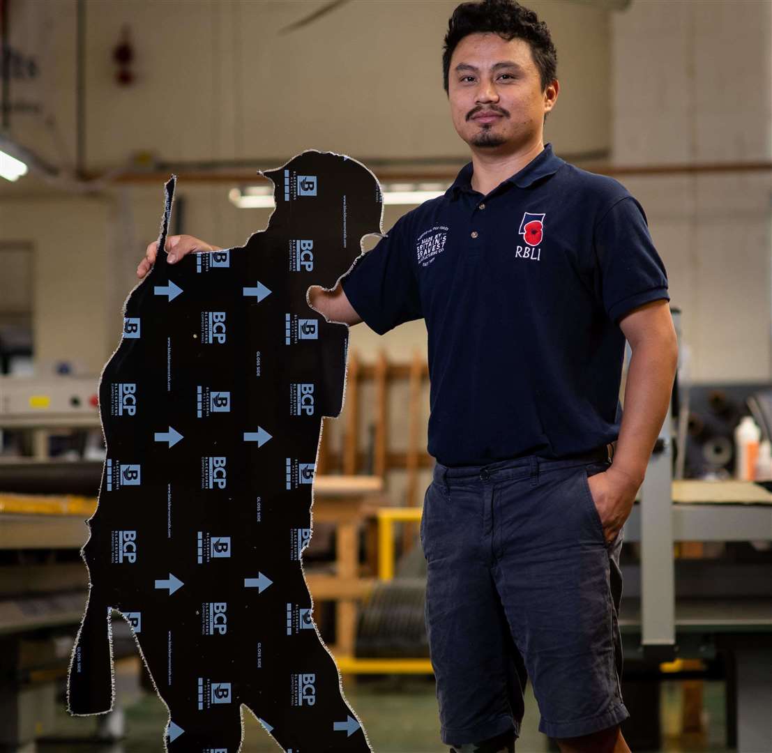 Former gurkha Anil Gurung with one of the Silent Silhouettes made in Kent