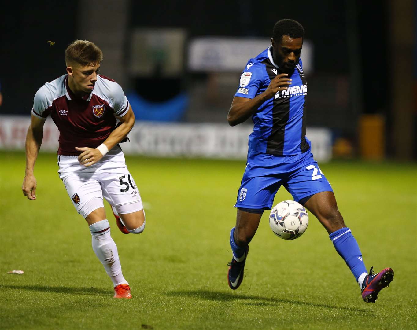 Harrison Ashby, scorer of West Ham's opener, up against substitute Mustapha Carayol Picture: Andy Jones
