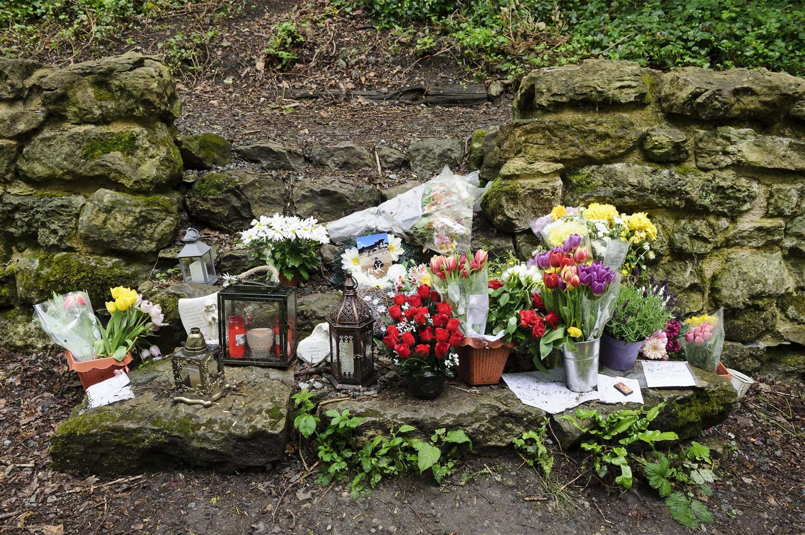 Flowers left in Crisbrook Meadow following the murder