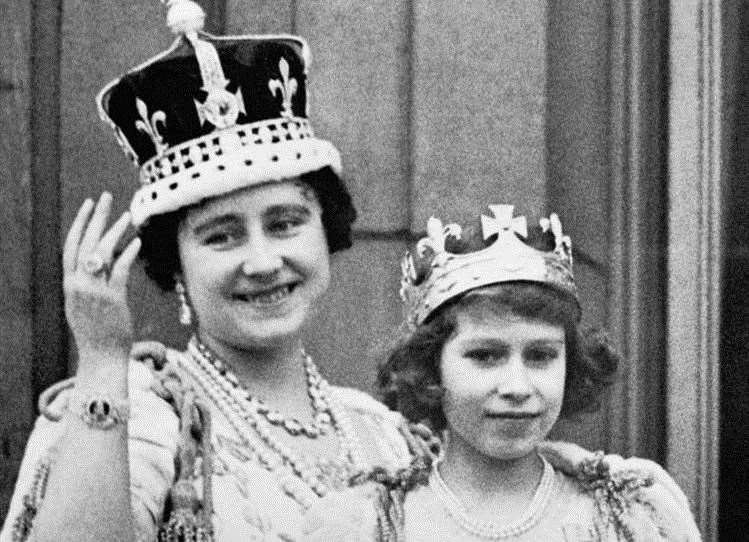 Queen Elizabeth (the Queen Mother) with her eldest daughter, Princess Elizabeth, on George VI’s coronation day. Image: PA.