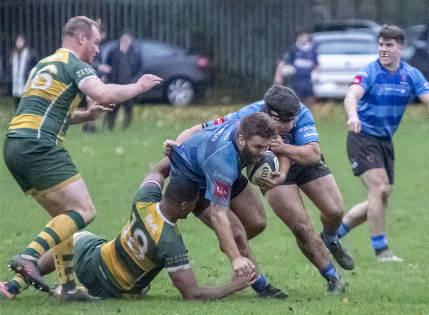 Canterbury's Billy Young (blue) drives forward against Barnes. Picture: Phillipa Hilton