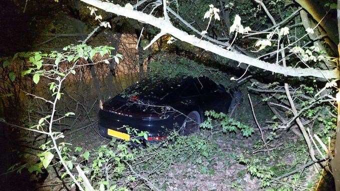 Hidden Porsche found in the foliage. Picture: Kent Police