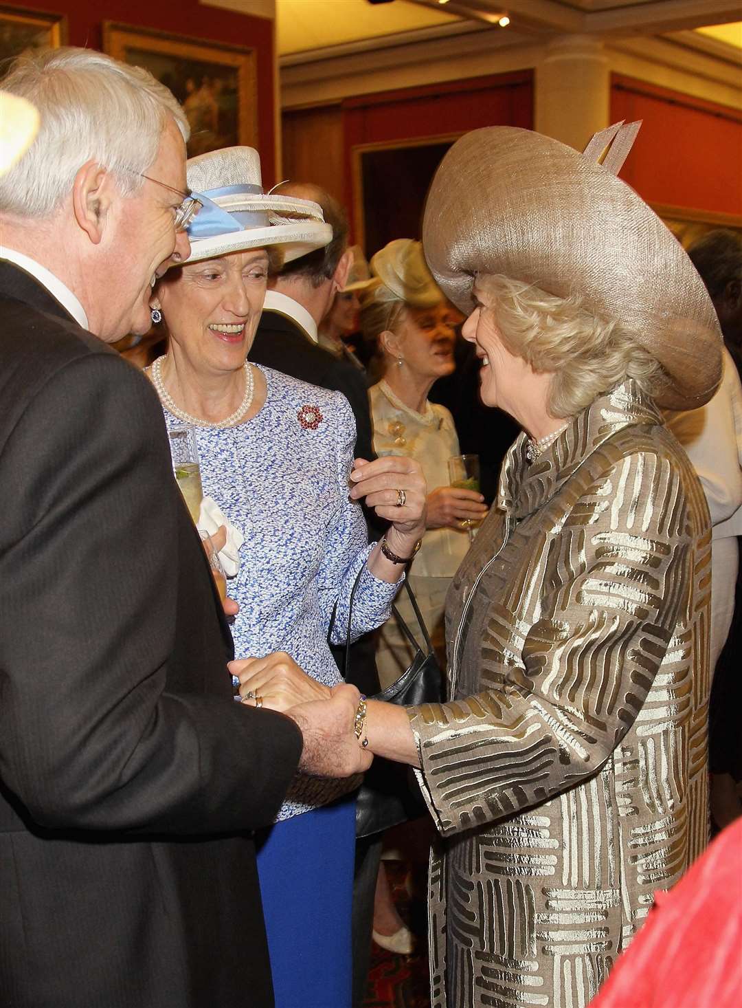 Former PM Sir John Major, Lady Susan Hussey and the Duchess of Cornwall at a reception for the Queen’s Diamond Jubilee in 2012 (PA)