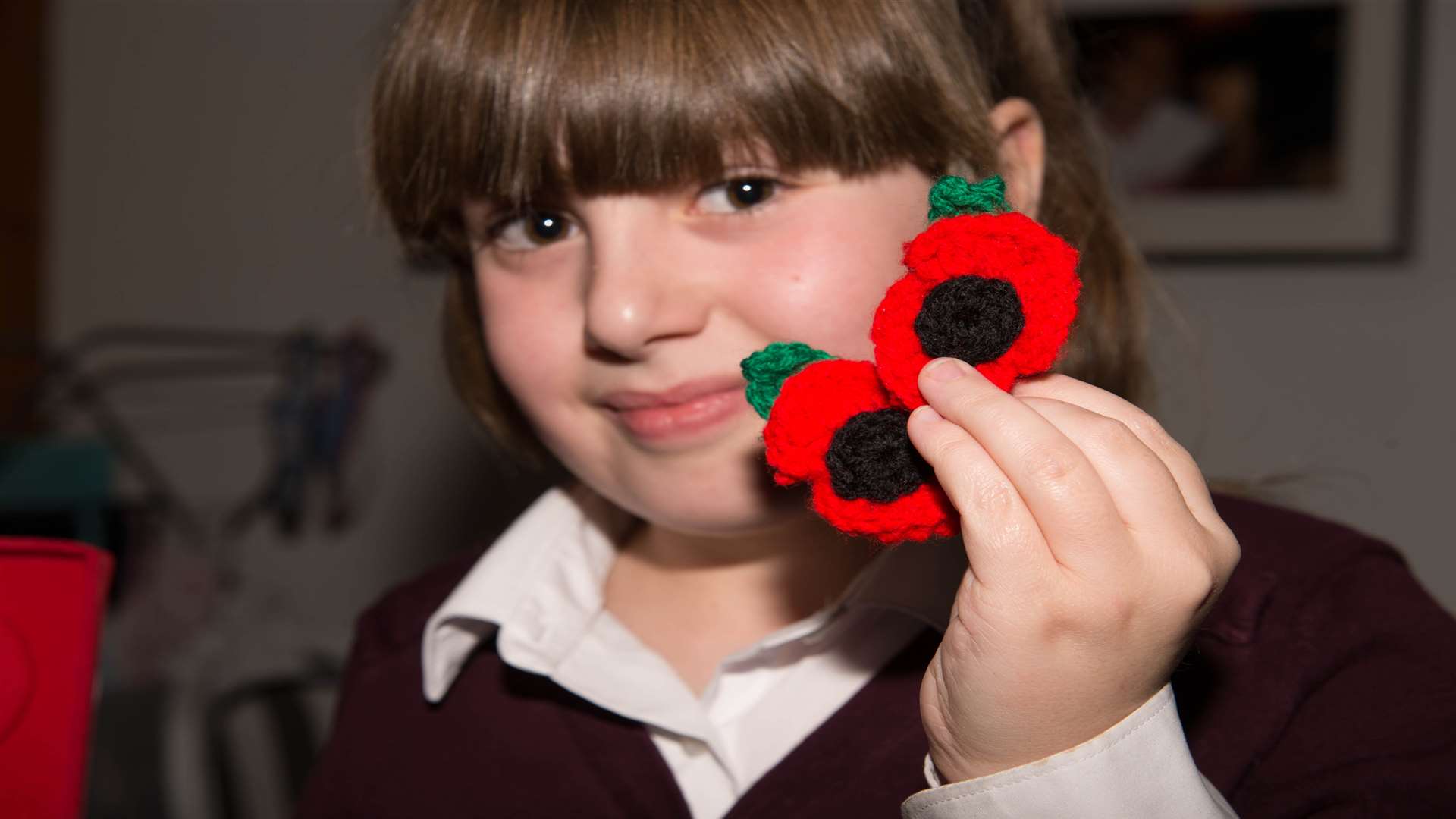 Charlotte-Mae has been crocheting poppies