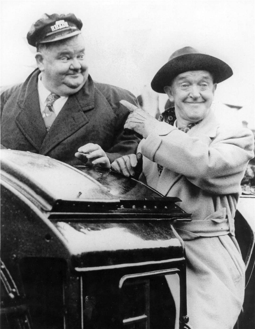 Stan Laurel, right, was another star to grace the stage at the Chatham venue. Here he is pictured with his comedy partner Oliver Hardy at the reopening of the Romney Hythe and Dymchurch Railway after the Second World War
