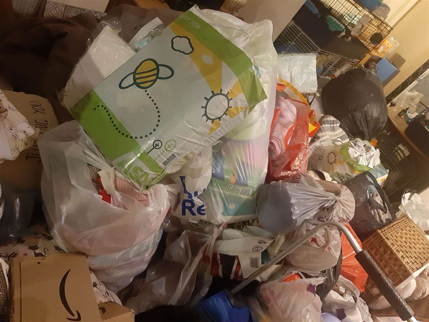 Danielle Hoynes' living room in Grove Park, near Sittingbourne, is flooded with donations to be sent to the Ukrainian border. Picture: Danielle Hoynes