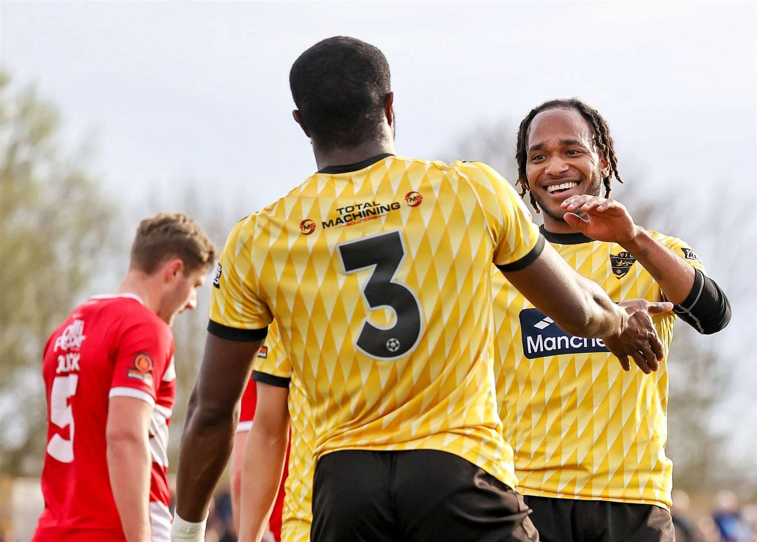 Lamar Reynolds, right, celebrates with Chi Ezennolim. Picture: Helen Cooper