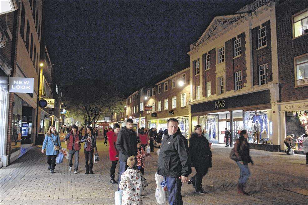 The High Street's packed... but shoppers are not feeling the festive glow from the decorations