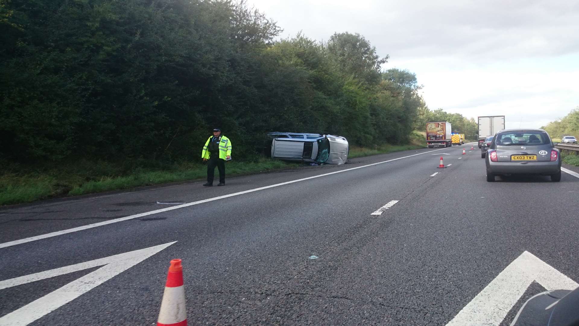 A car has overturned on the M2.