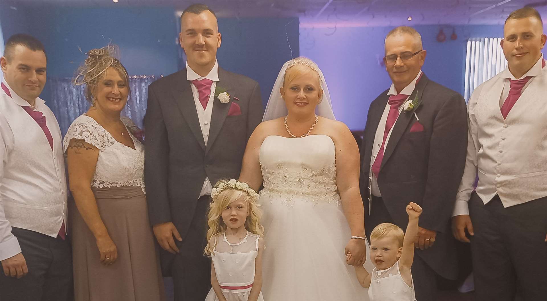 Rebecca and family on her wedding day in 2017. l-r brother Warren, mum Amanda, husband Ian, Rebecca, dad Andrew and brother Alan, in front; daughters Amber and Jessica