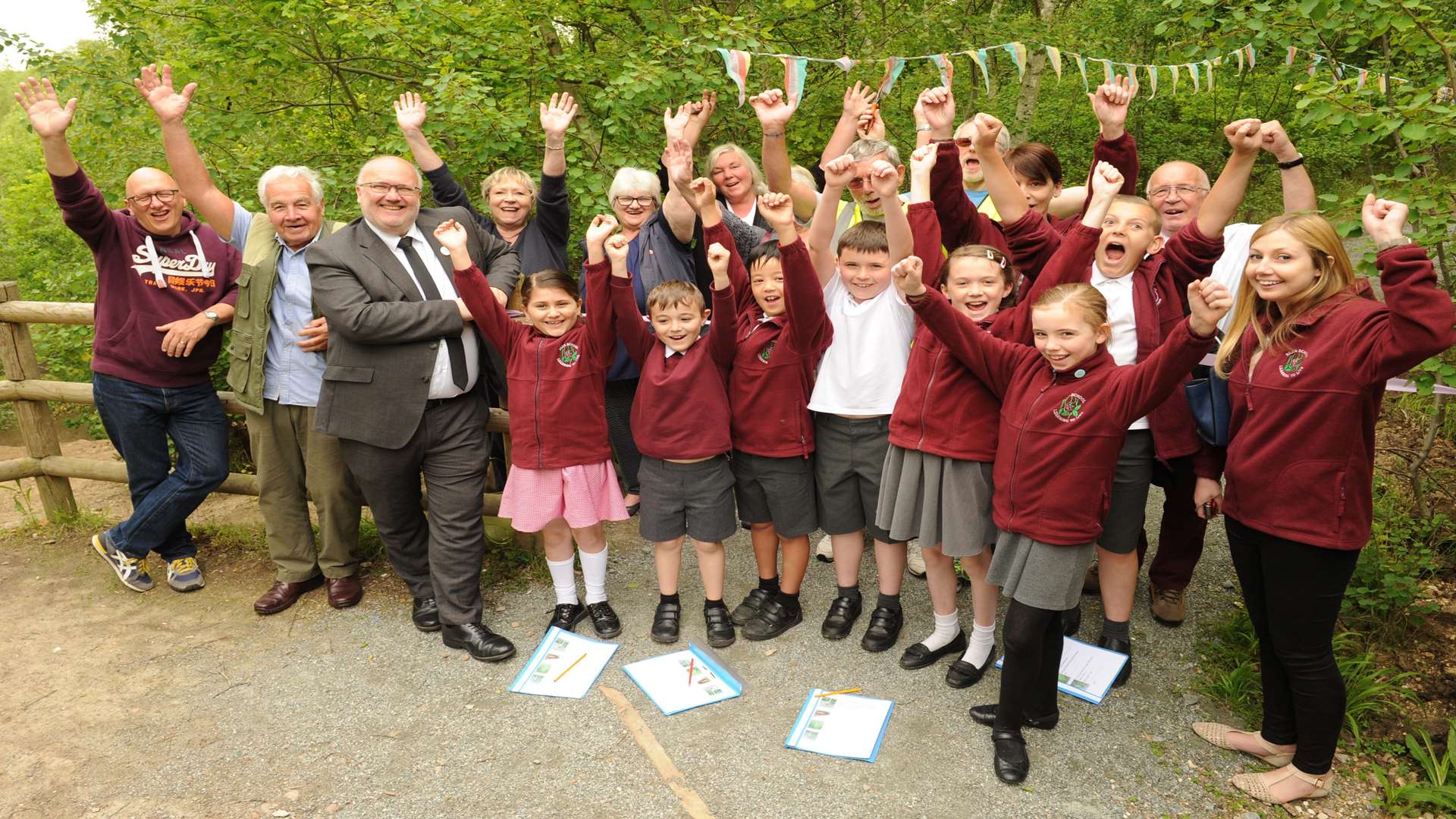 Youngsters from Bean Primary School celebrate the reopening of the path. Picture: Steve Crispe