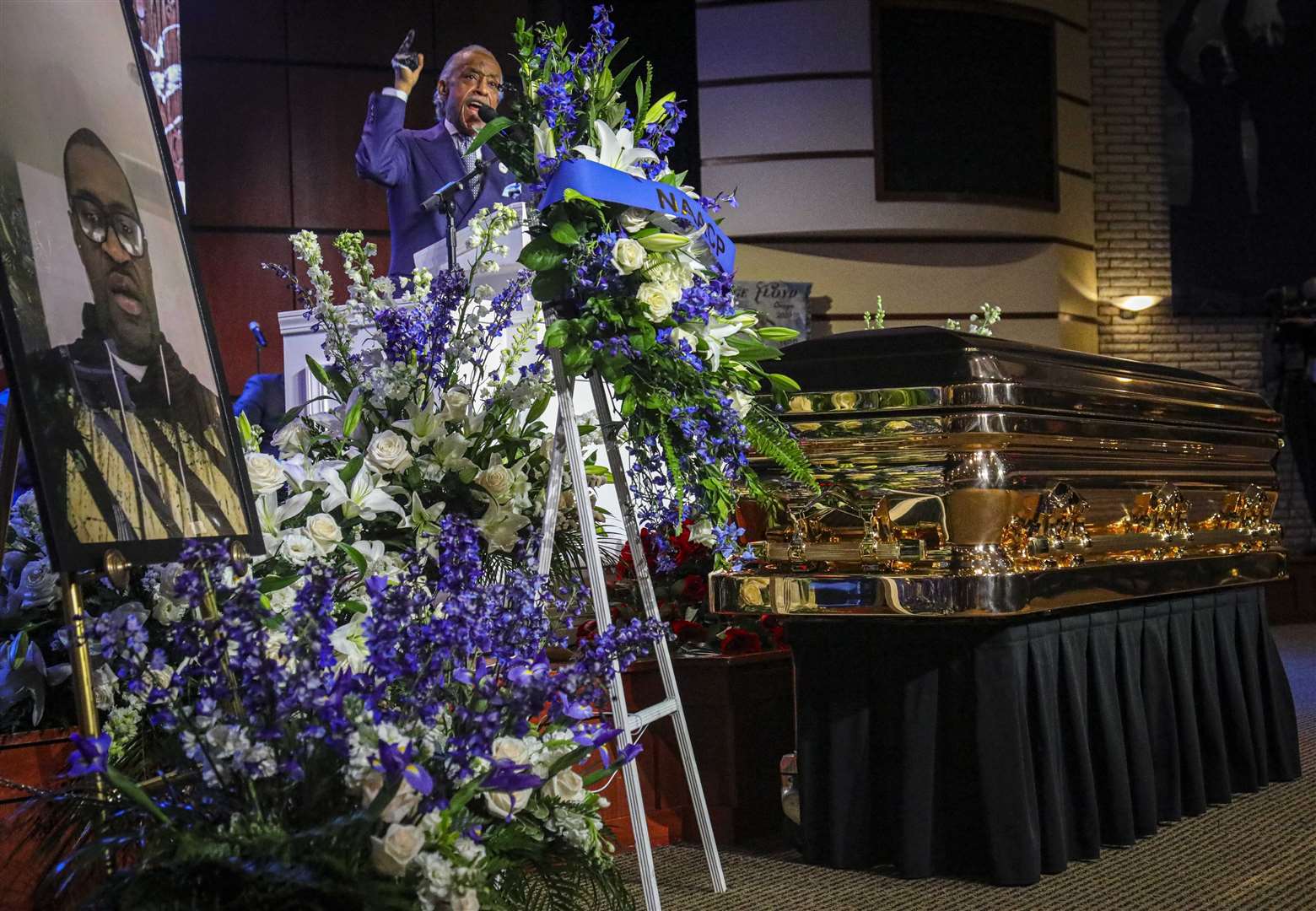 Civil rights activist Rev Al Sharpton delivers the eulogy at a memorial service for George Floyd (Bebeto Matthews/AP)