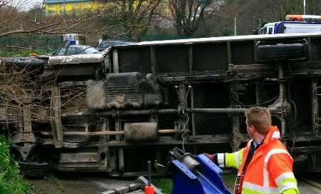 The lorry came to rest across the pavement. Picture: PHIL MEDGETT