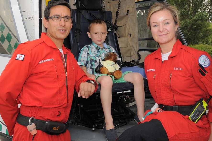 Clutching his air ambulance teddy bear, little Kye Sharrad meets Dr Stephanie Tilston and paramedic Jez Loseby