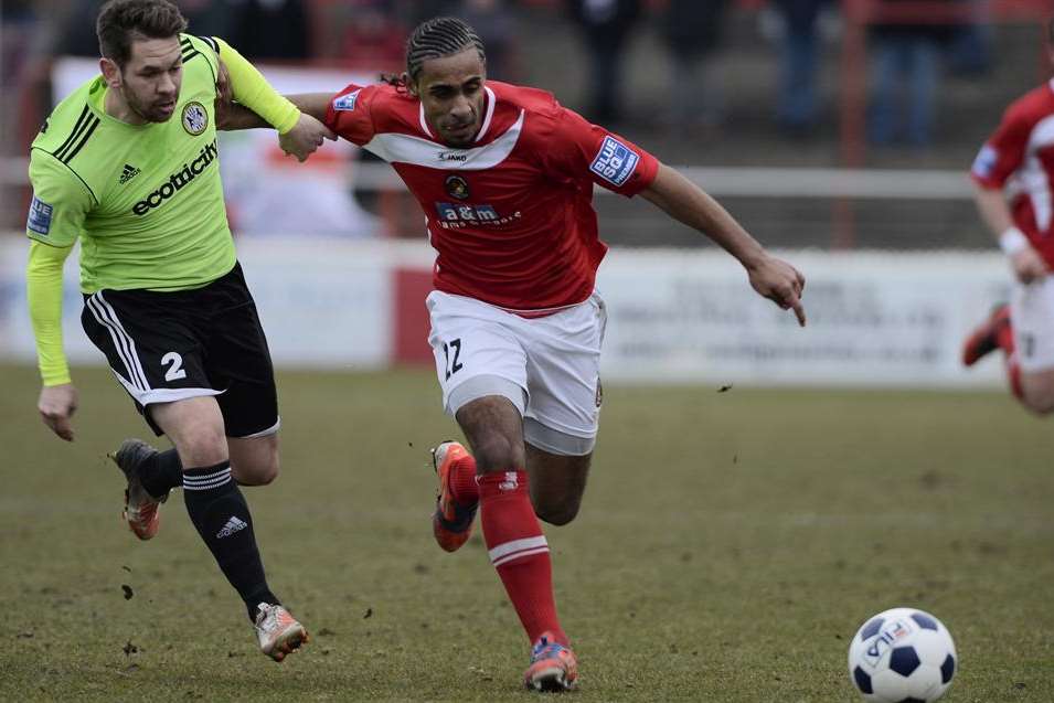 New Dover signing Stefan Payne chases a ball while playing for Ebbsfleet (red) against Forest Green. Picture: Andy Payton FM2526771