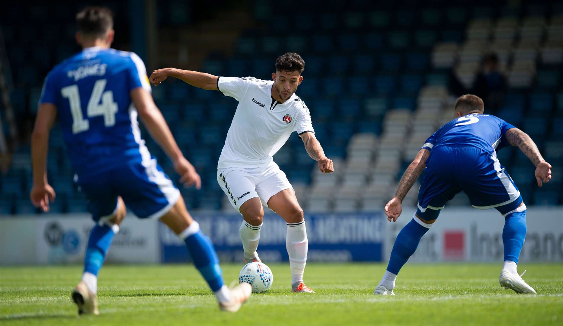 Charlton's Macauley Bonne runs at Gillingham defenders Alfie Jones and Max Ehmer Picture: Ady Kerry