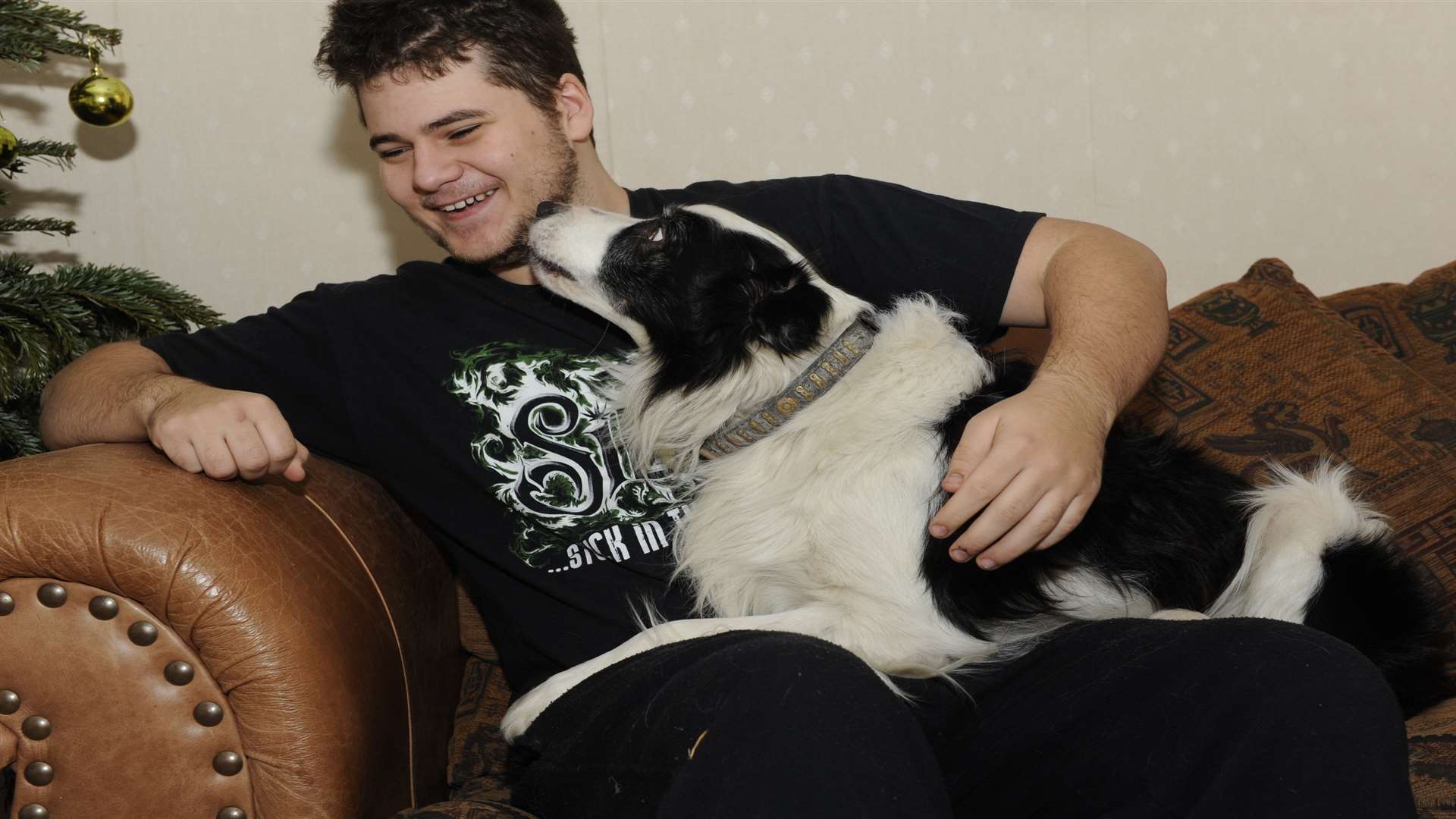 Simon O'Brien safe at home with his dog Skippy after they both had to be rescued from Whitstable Harbour