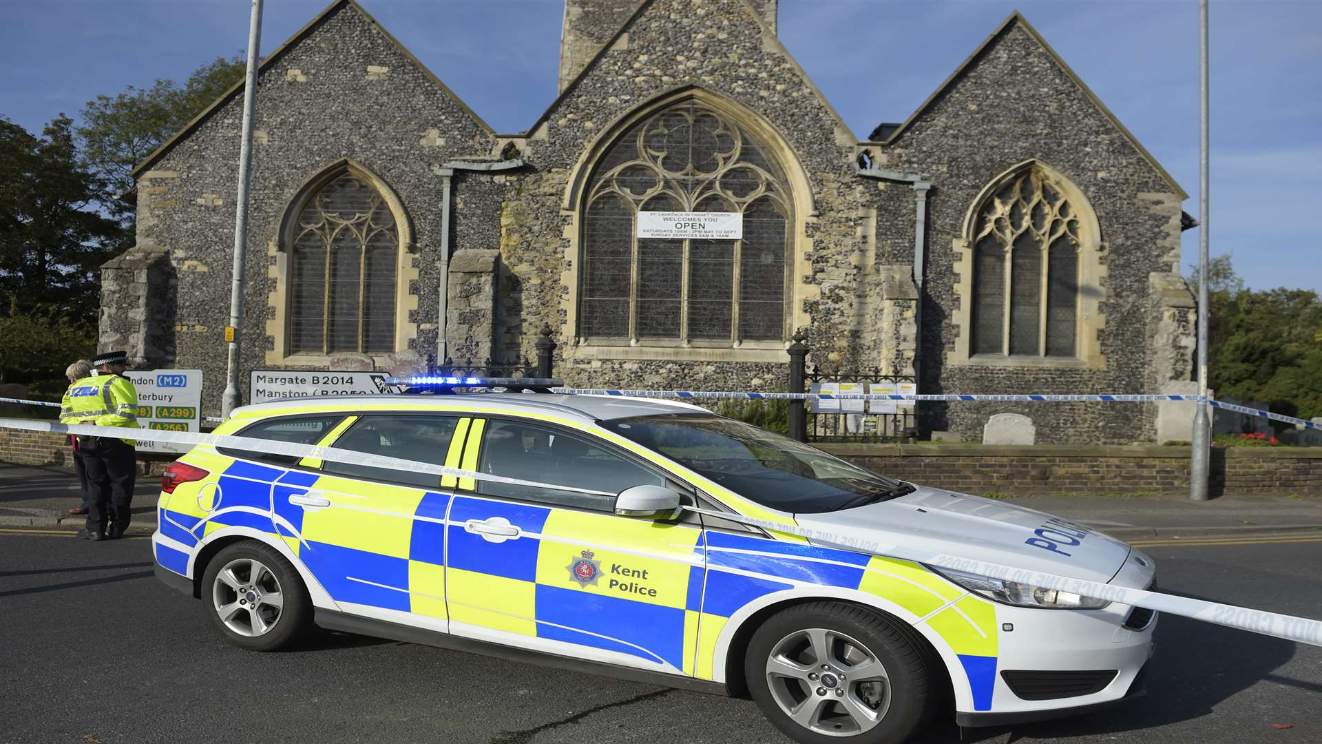 Police outside St Lawrence-in-Thanet Church after the stabbing nearby.