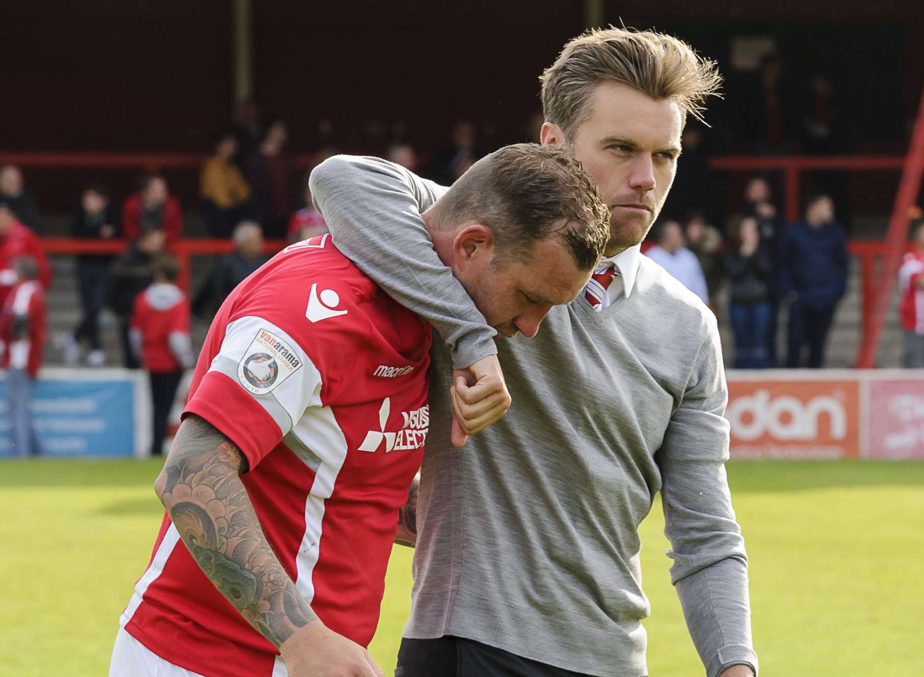Ebbsfleet boss Daryl McMahon consoles Danny Kedwell Picture: Andy Payton