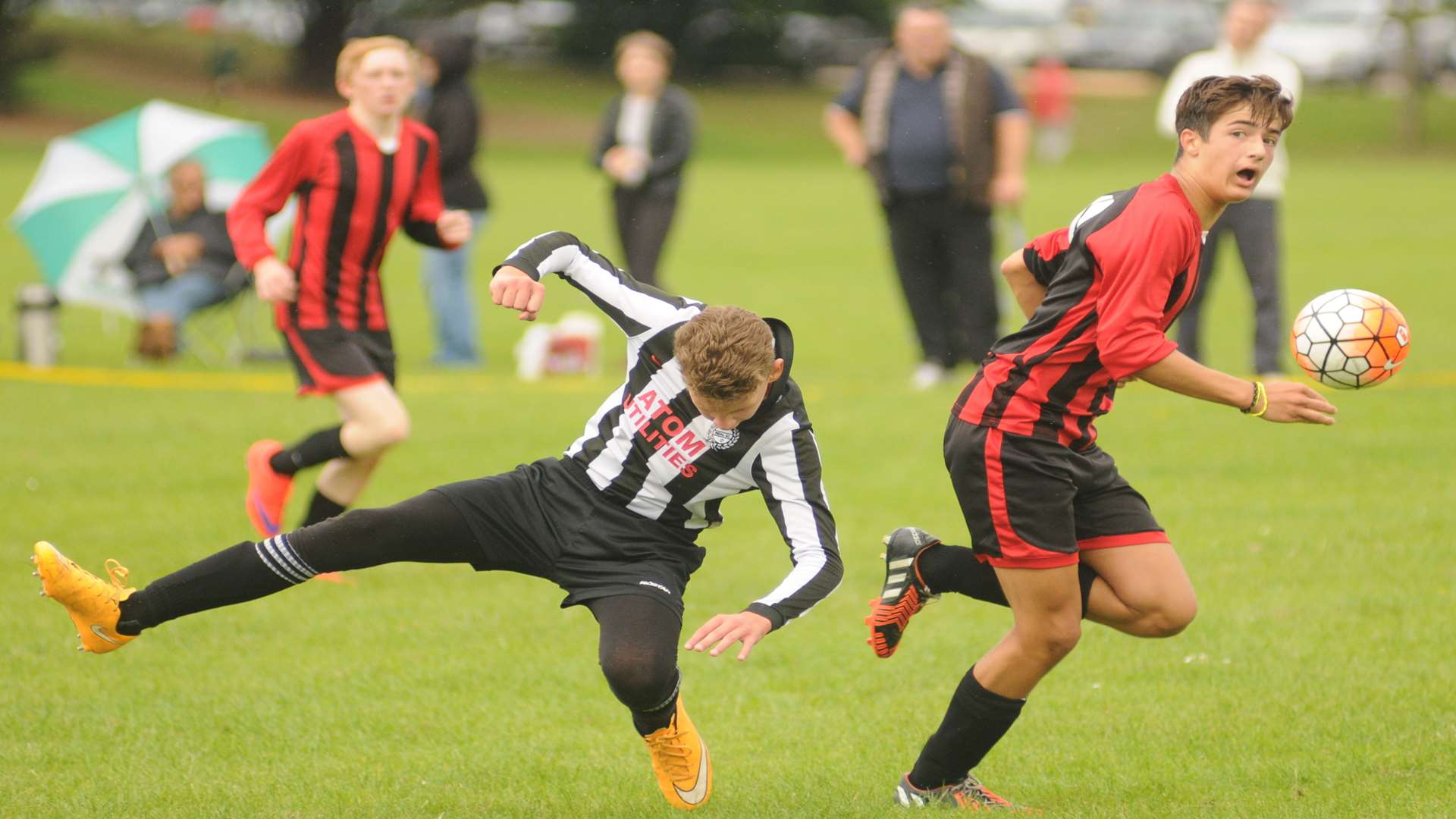 Meopham Colts under-15s, red, get away from Real 60 in Sunday's Division 2 clash Picture: Steve Crispe
