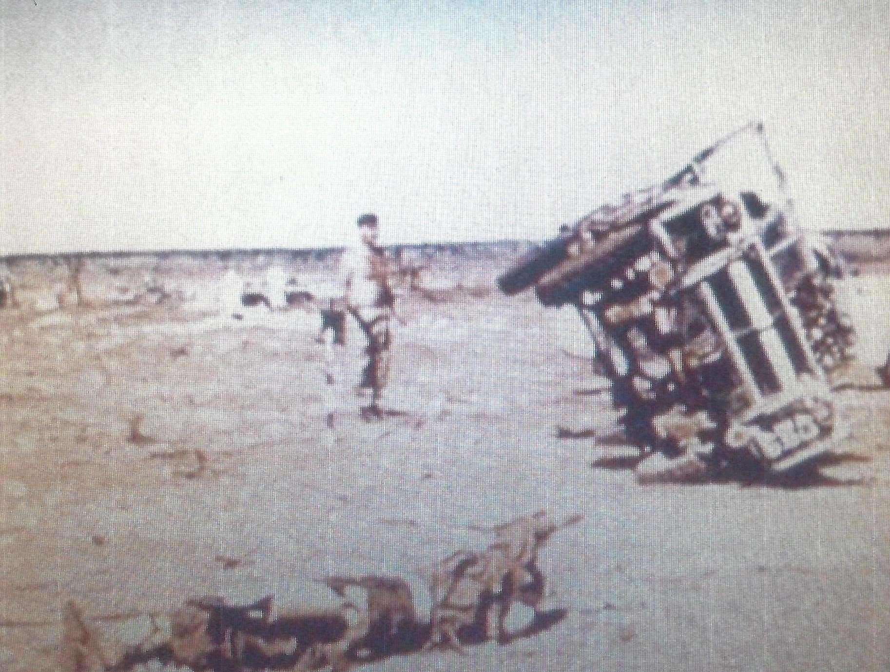 A vehicle tipped over in the blast