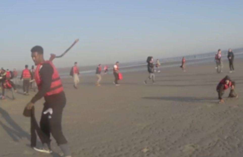 Shocking footage shows police being attacked by a mob on the beach in France. Picture: Kent Police