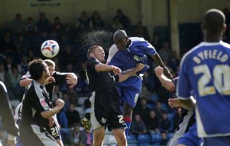 Ian Cox heads at goal but Gillingham failed to find a breakthrough. Picture: MATTHEW READING
