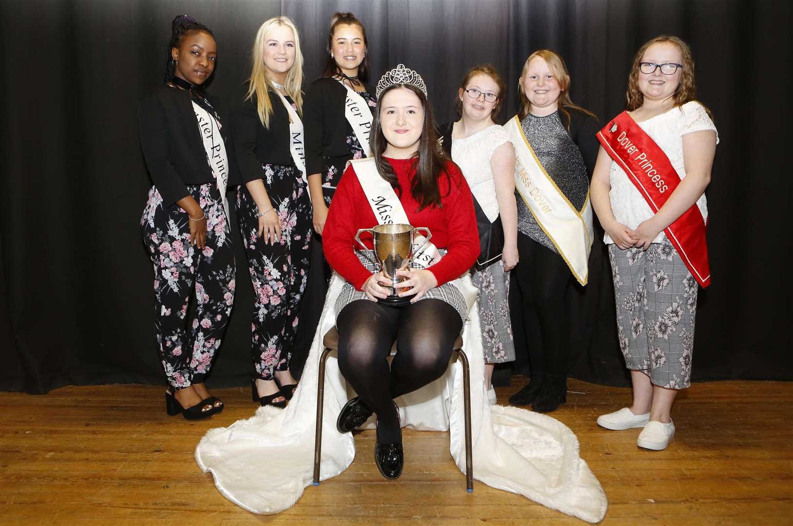 Crowning of the new Miss Whitstabl, from left, Lenhle Motsa, Danielle Law, Jessica Law, Miss Whitstable Jade Rafferty, Miss Dover Honor Precious, Junior Miss Dover Isabelle Holley and Senior Miss Dover Jasmine Holley. Picture: Andy Jones
