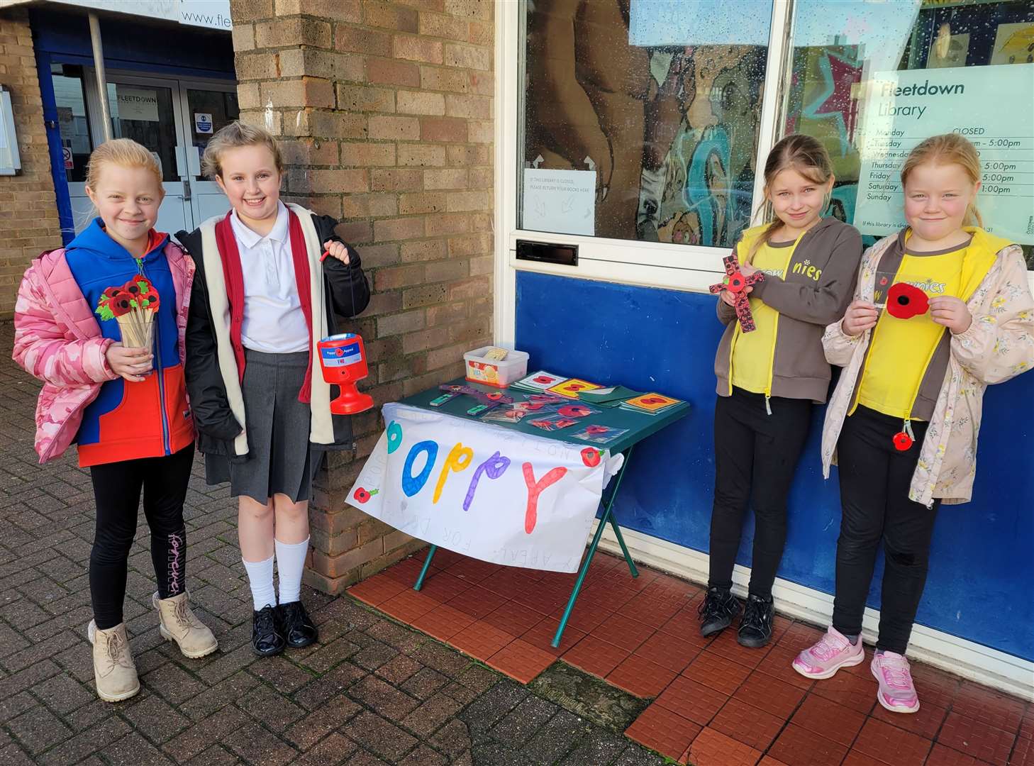 Jessica and Alex Salter, pictured here with two school friends at Tuesday's stall outside Fleetdown Library