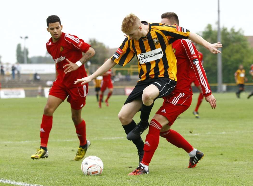 Charley Robertson in action for Folkestone Invicta against Merstham Picture: Matt Bristow
