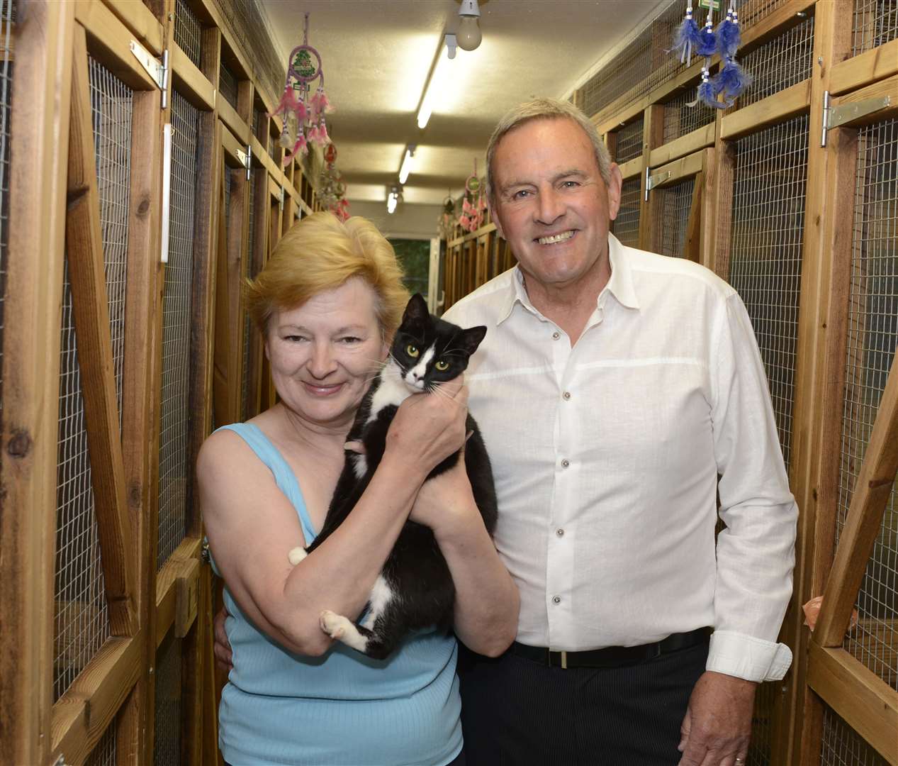 Ray with his wife Sue in their cattery. Picture: Paul Amos