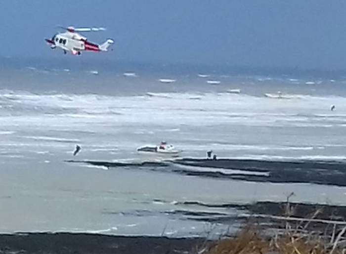 The Coastguard helicopter helped in the rescue after a boat was grounded. Picture: Mark Moreton